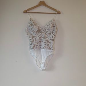 White lace bodysuit from hello molly. XS